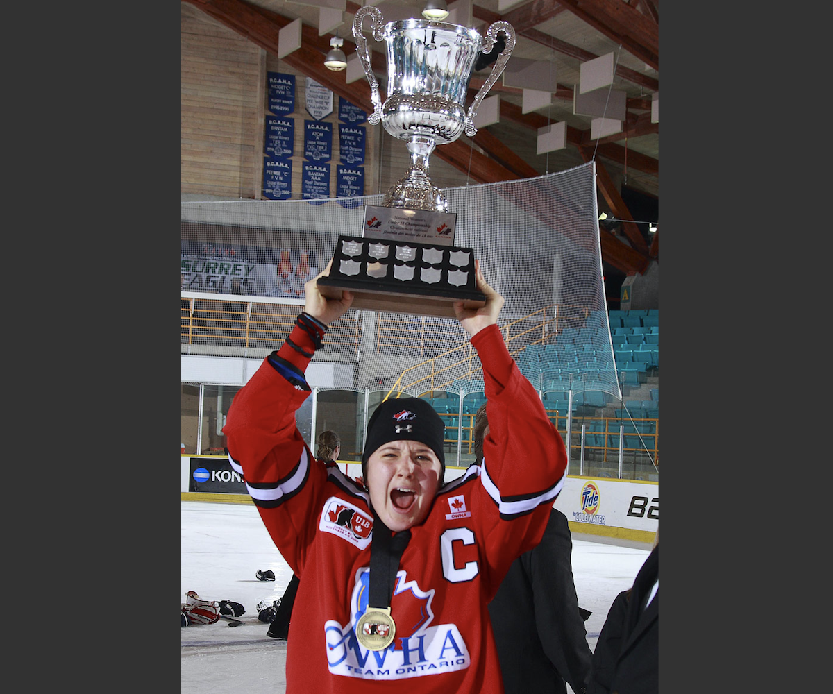 17 Jamie Lee Rattray lifting the cup for Team Ontario Red